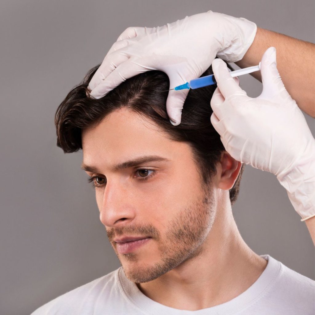 Man getting injection in hairline